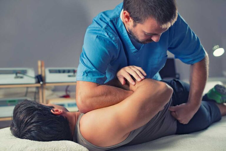 A person rolling onto their side in bed with careful body alignment and hands pushing up to sit.